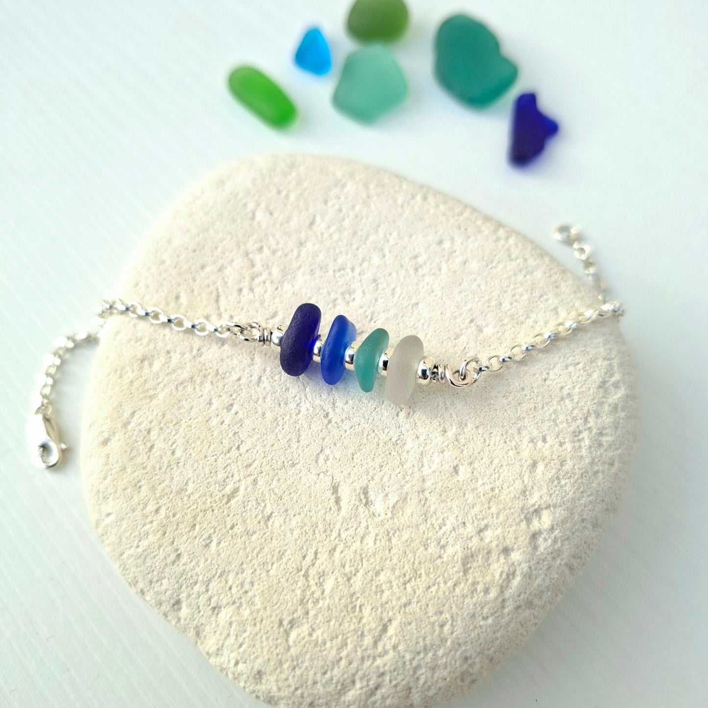 Silver bracelet with sea glass in shades of blue, made in Cyprus.