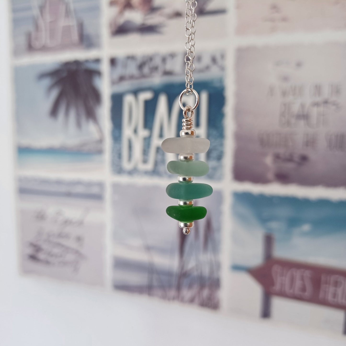Silver and sea glass stack necklace in coastal colours.