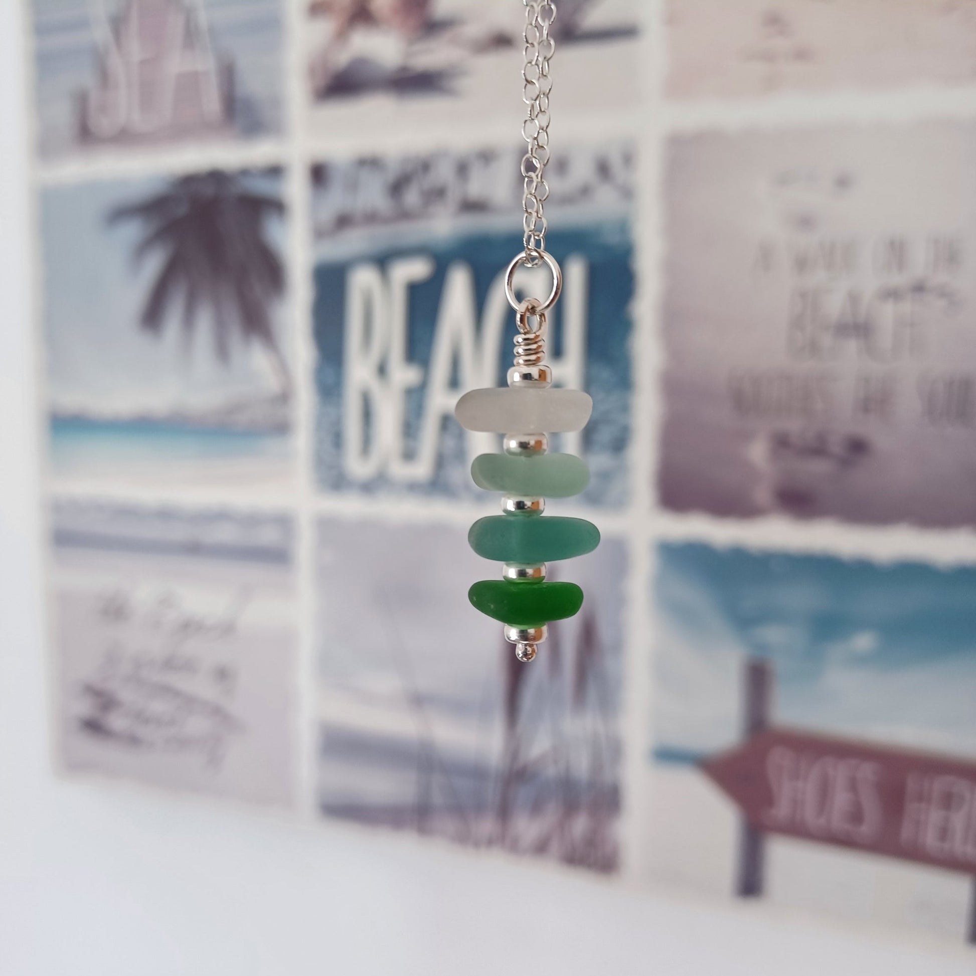 Silver and sea glass stack necklace in coastal colours.