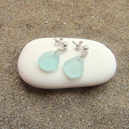 A pair of sterling silver sea foam sea glass drop earrings. 
